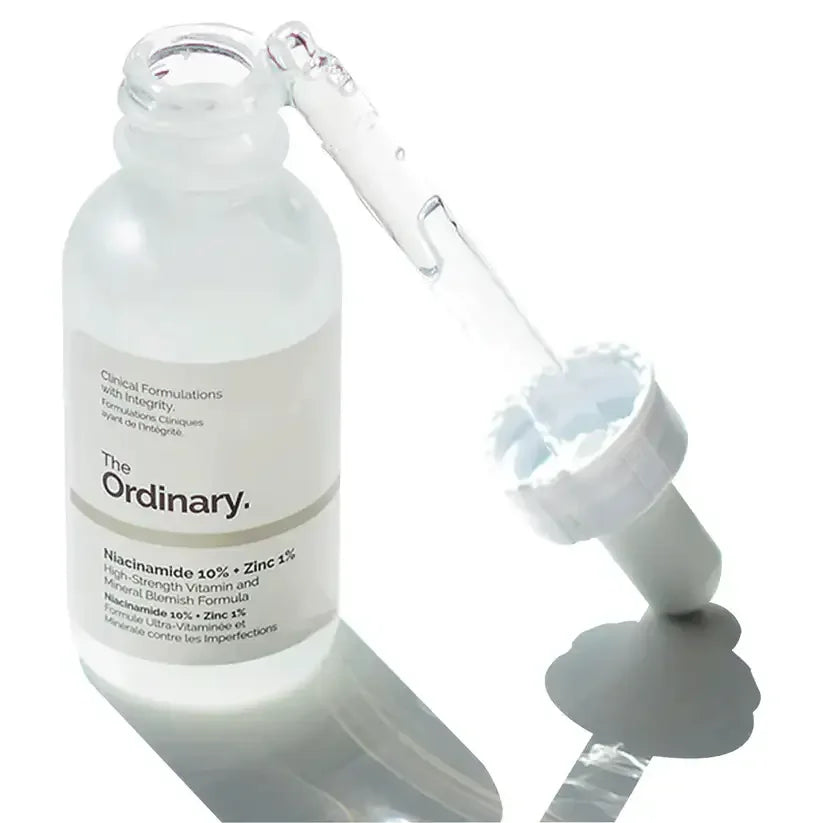 The Ordinary Niacinamide 10% Zinc 1% serum bottle with dropper on white background