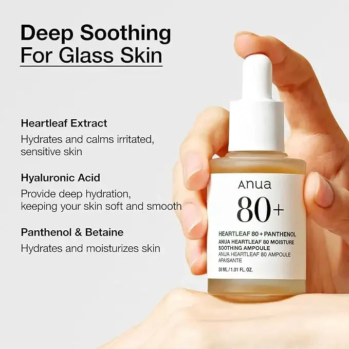 Hand holding Anua 80+ Heartleaf Moisture Soothing Ampoule serum, hydrating skincare for sensitive skin