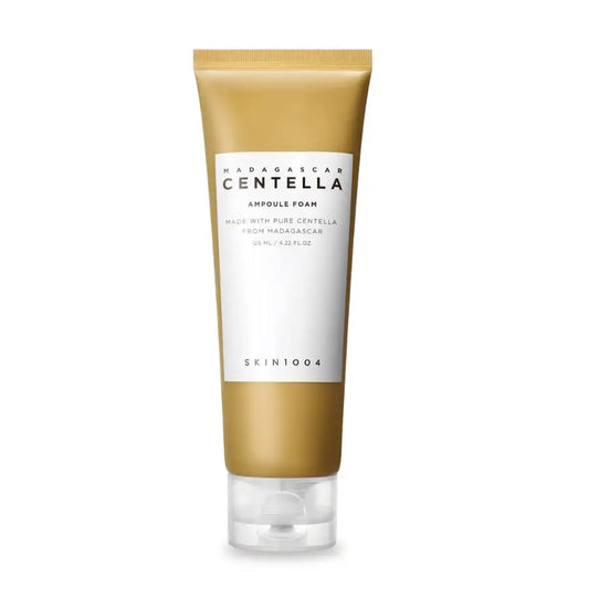 SKIN1004 Madagascar Centella Ampoule Foam cleanser tube with gold and white packaging.