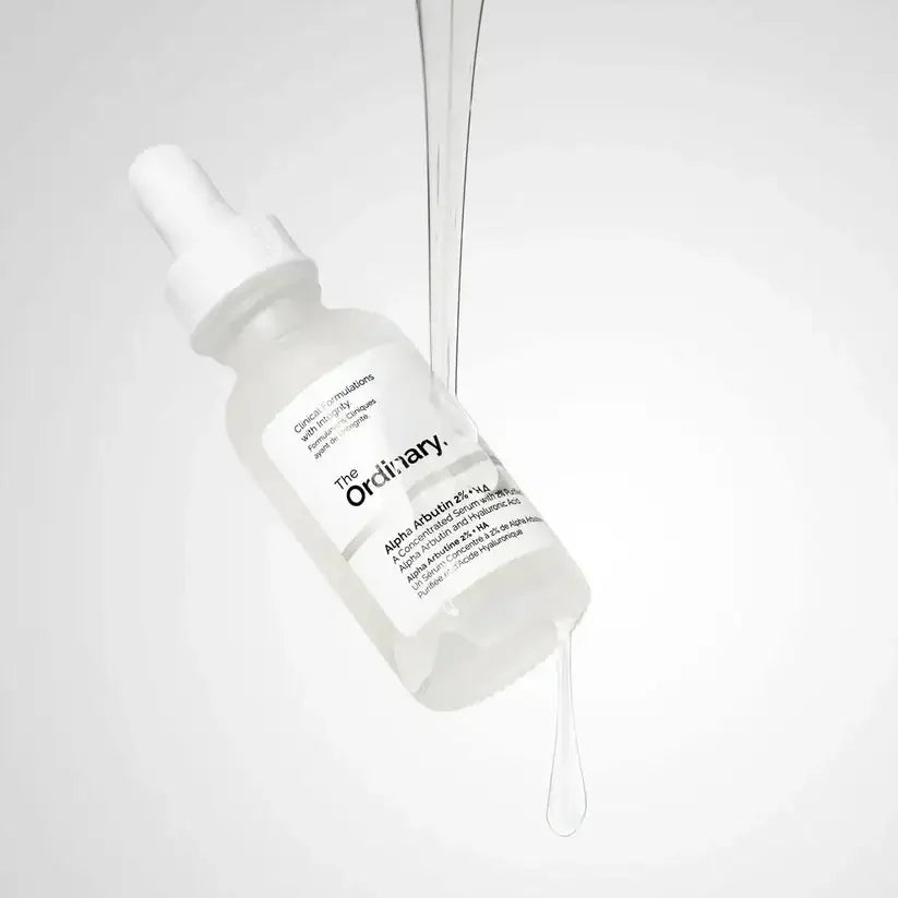 The Ordinary Alpha Arbutin 2% + HA serum dropper bottle with clear liquid on white background