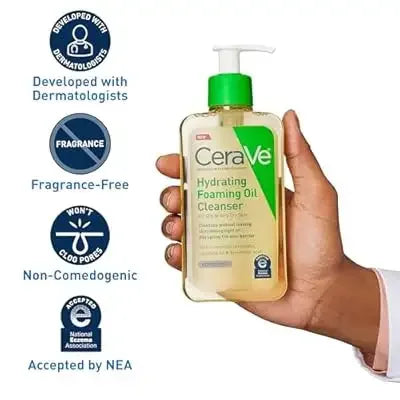 Hand holding CeraVe Hydrating Foaming Oil Cleanser, fragrance-free, non-comedogenic skincare