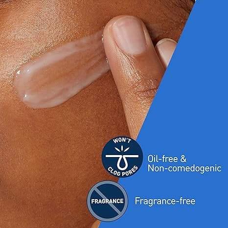 Applying oil-free, non-comedogenic, fragrance-free cream to face for skincare
