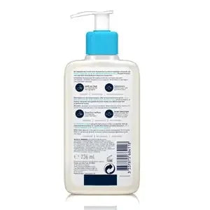 Back of a skincare product bottle with blue pump, displaying usage instructions and ingredients.