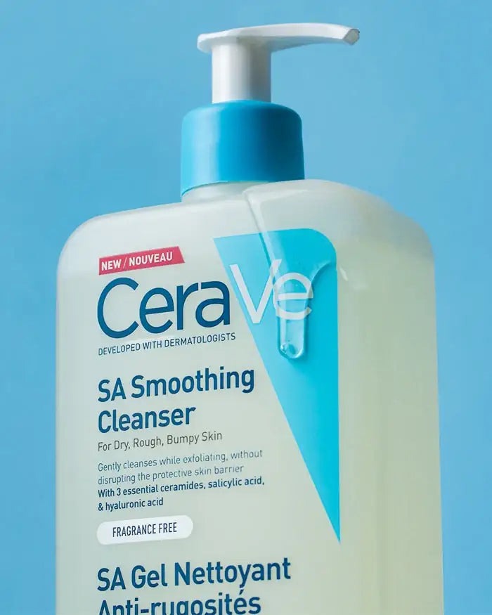 CeraVe SA Smoothing Cleanser bottle with pump for dry, rough, bumpy skin against blue background