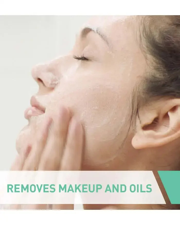 Woman cleansing face with skincare foam, removing makeup and oils, close up, skincare routine