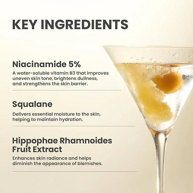 Skincare ingredients list featuring niacinamide, squalane, and Hippophae rhamnoides fruit extract beside a cocktail glass.