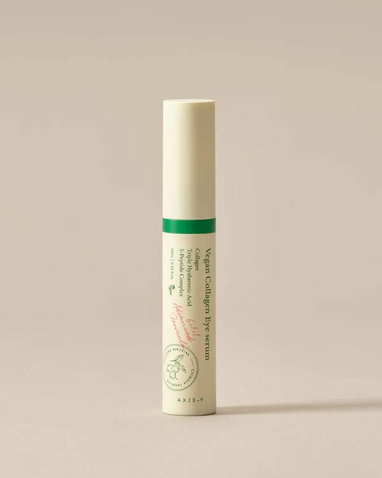 Vegan Collagen Eye Serum tube with green cap on a neutral background, skincare product