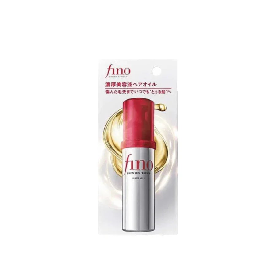 Fino Premium Touch hair oil in silver bottle with red cap, Japanese packaging, product display