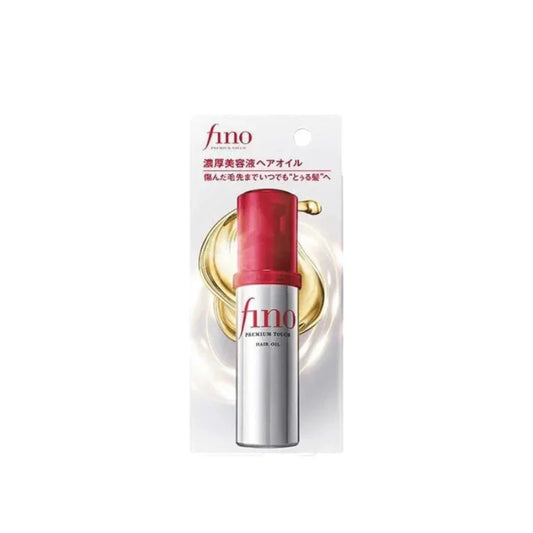 Fino Premium Touch hair oil in silver bottle with red cap, Japanese packaging, product display