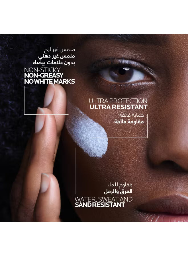 Close-up of a woman applying sunscreen cream to her cheek, highlighting non-sticky, non-greasy, ultra-resistant, water- and sand-resistant skincare benefits.