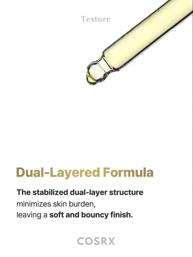 Vitamin C serum dropper showing yellow liquid, highlighting dual-layered skincare formula