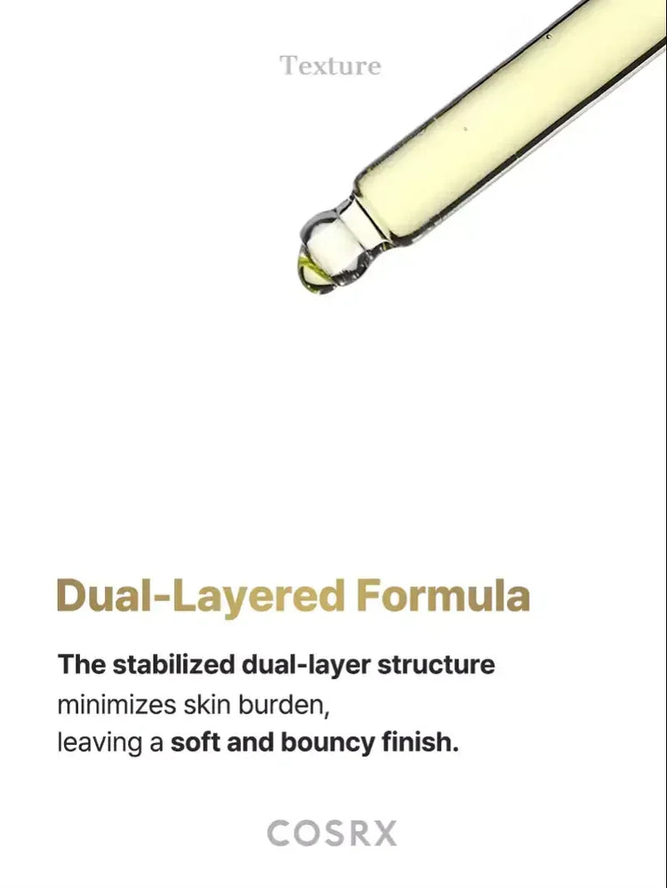 Vitamin C serum dropper showing yellow liquid, highlighting dual-layered skincare formula