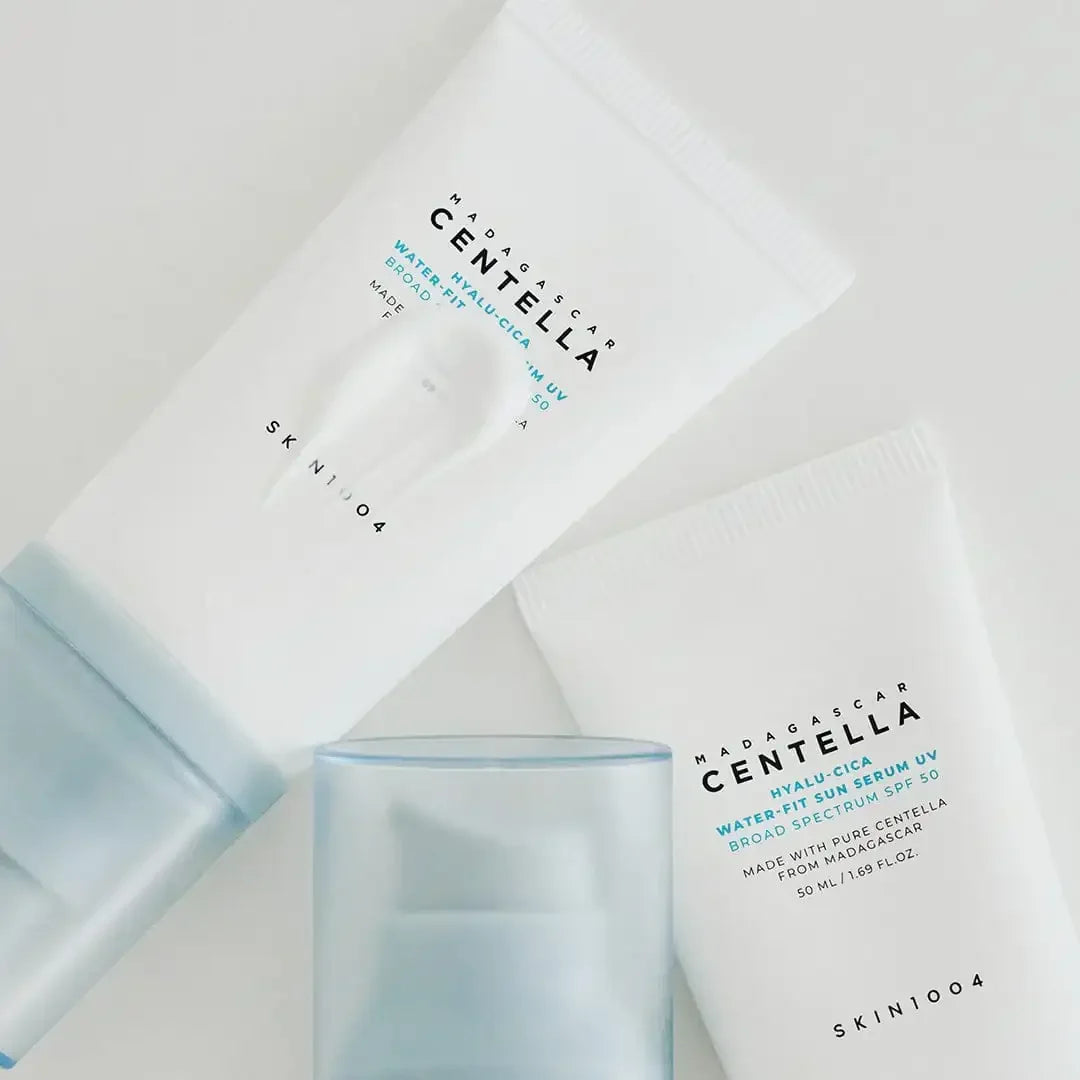 SKIN1004 Centella Hyalu-Cica Water-Fit Sun Serum SPF 50 tubes on a white background